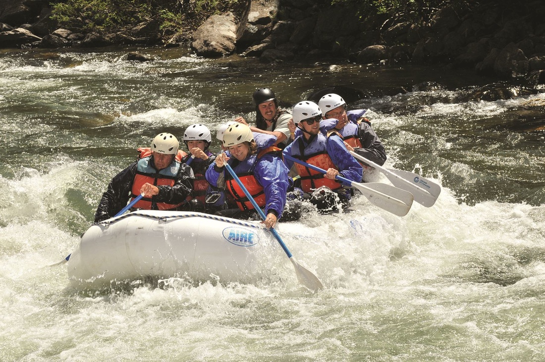 Excited group rafting near Yellowstone.